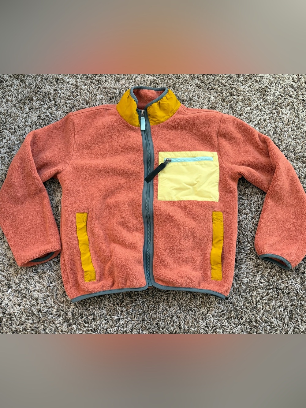 Kids Patagonia Orange Fleece Jacket with Yellow Pocket Accent